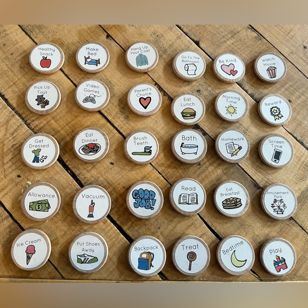 30 handmade wooden round chore magnets for children. From Etsy.